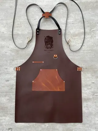 Dark brown apron with a tan pocket